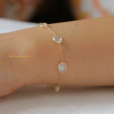 Rainbow Moonstone Bracelet/ 18k Yellow Gold Bracelet/ Gold Chain Bracelet/ Blue Flashy Moonstone/ Moonstone Bracelet/  Valentine Day Gifts  GEMSTONE DETAILS  ✦ Gemstone : Rainbow Moonstone  ✦ Gemstone Type : Natural ✦ Gemstone Shape : Oval ✦ Gemstone Color : As images ✦ Gemstone Cut :  Oval ✦ Number of Gemstones: 1 ✦ Gemstone Grade: Excellent ✦ Gemstone Weight : 1.11 CT METAL DETAILS  ✦ Metal : 18K Gold ✦ Metal Color : Yellow Gold/White Gold/Rose Gold ✦ Bracelet Size : 7.5 Inch  ✦ Total Weight : 2.1 Gram ✦ Bracelet Box : Yes CUSTOMISATION DETAILS  We can customize any piece of fine jewelry. You can simply message us on Etsy or drop a text at +91-7357229656 (WhatsApp/I Message) to let us know about all the customization you want. Customization can include  ✦ The Gemstone: This ring can be m Moonstone Natural Stone Bracelets, Round Moonstone Bracelets For Gift, Gemstone Moonstone Bracelets, Moonstone Bracelets As A Gift, Elegant Moonstone Crystal Bracelet For Gift, Round Natural Stones Bracelet In Fine Jewelry Style, Round Natural Stones Bracelets Fine Jewelry, Fine Jewelry Bracelets With Natural Stones, White Moonstone Bangle Bracelet