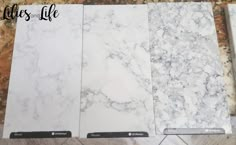 three different types of marble on display in a store