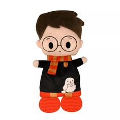 a stuffed animal with glasses and a scarf