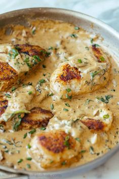 chicken with gravy in a skillet ready to be eaten