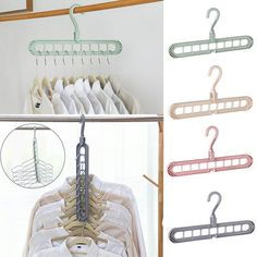 clothes hangers are hanging on the rack in front of a mirror and two pictures of shirts