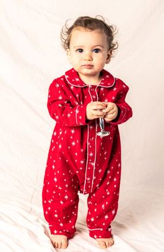 With classic tailored details, these baby-size pajamas have plenty of style and are made from soft brushed flannel for cozy comfort. Meets Consumer Product Safety Commission's flammability standards for children's sleepwear 60% cotton, 40% modacrylic Machine wash, dry flat Imported Star Print Long Sleeve Sleepwear For Loungewear, Star Print Long Sleeve Sleepwear For Pajama Party, Long Sleeve Sleepwear With Star Print For Bedtime, Long Sleeve Star Print Sleepwear, Long Sleeve Sleepwear With Star Print, Red Onesie For Winter Loungewear, Red Winter Onesie For Loungewear, Red Long Sleeve Jumpsuits And Rompers For Loungewear, Red Long Sleeve Jumpsuit For Loungewear