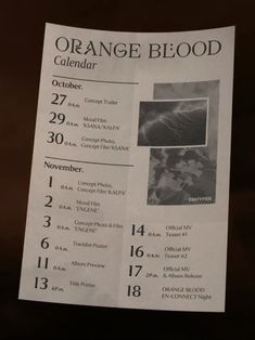 an orange blood calendar hanging on the wall