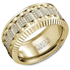 a yellow gold wedding band with rows of diamonds