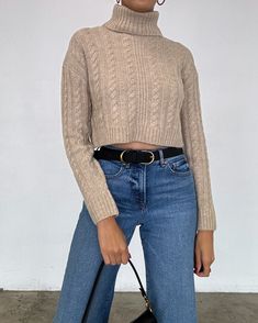 Stay cozy and oh-so-stylish with our Roxy Cropped Sweater! This cute knit top features a high neck and long sleeves, plus a cable knit pattern to seal the deal! Rock it solo or dress it up for an elevated look, it's your choice! More Details: - Fits true to size for most - Stretchy - Long sleeves - High neck - Cropped - 64% ACRYLIC 17% NYLON 19% POLYESTER - Color may vary due to the lighting Model Details: Height 5'7 | Chest 34" Cup size C | Waist 27" Hips 36.5" | Weight 115lbs | Wears a US size small in tops and dresses. Fitted High Neck Cropped Sweater For Winter, Casual High-neck Cropped Sweater For Fall, Fitted High Neck Cropped Sweater, Ribbed Stretch High Neck Cropped Sweater, High-end Long Sleeve Cable Knit Cropped Sweater, Cable Knit Pattern, The Deal, Knit Pattern, Stay Cozy