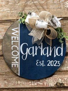 Welcome your guests with this modern last name established door hanger. Hand painted on 1/2inch thick birch lumber measuring 16in in diameter. This wooden door wreath is complete with a burlap bow and greenery, hanging by a jute rope hanger. They also make great bridal shower or wedding gifts. Simply leave last name spelling and established date/year in the NOTES section at checkout. All orders are made to order in house at WMD> please allow up to 2 weeks processing. Last Name Welcome Signs, Last Name Signs Wooden Diy, Diy Door Decor, Hospital Door Hangers, Hospital Door, Burlap Bow, Orange Boxes, Last Names, Round Door