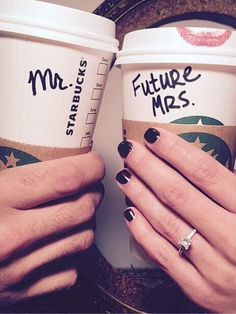 two people holding coffee cups with their hands on top of each other and the words future mrs written on them