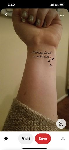 a woman's arm with a tattoo saying nothing loved is ever lost