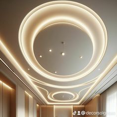 the ceiling is decorated with circular lights and round lighting fixtures on either side of it