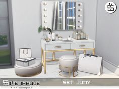 an image of a white vanity with mirror and stools in the room that is decorated