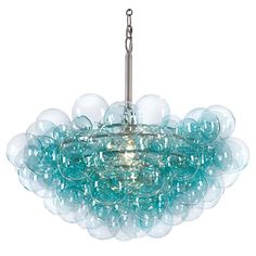 a glass chandelier hanging from a chain