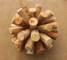 a bunch of wine corks are arranged in a circular arrangement on the table top