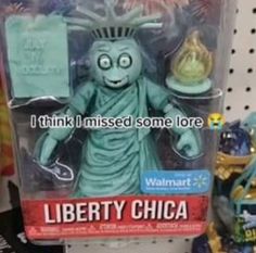 the statue of liberty doll is on display in a toy store, and it says i think i missed some lore