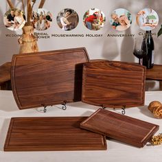 three wooden serving trays with pictures on them