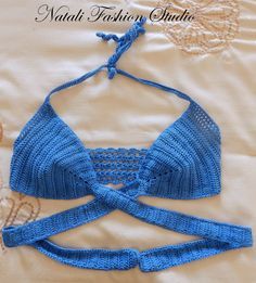 TOP ONLY Hand made. Available sizes: XS, S, M, L, XL TOP SIZE GUIDE: Since everyone has different preferences when it comes to coverage, sizes are a suggestion only. Feel free to message me if you have any sizing questions. XS(4.5): 32A or smaller S (5): 32A, 34A, 32B, 34B M (6): 36A, 34B, 36B, 32C, 34C, 32D L (7): 36C, 32D, 34D, 36D, 32DD XL (8): 36D or larger ***Please note that some bra sizes are listed more than once. In this case, choose your size based on coverage desired. Care... Crochet Swimsuit Bottoms, Crochet Swimsuit, Bead Bag, Crochet Bra, Crochet Swimwear, Top Bra, Beaded Handbag, Swimwear Shorts, Mini Dresses Summer