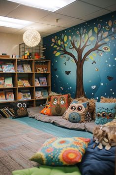 an owl themed children's room with bookshelves