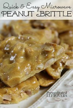 two pieces of peanut brittle sitting on top of a white plate with the words quick and easy microwave peanut brittle