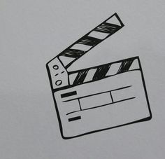 a black and white drawing of a clapper on top of a piece of paper