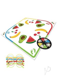 a play mat with fruit and vegetables on it next to two pairs of eyeglasses