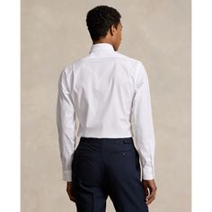 This polished shirt is crafted with 120s-quality two-ply cotton poplin and features our signature embroidered Pony. Formal White Poplin Tops, White Poplin Tops For Formal Occasions, Fitted Poplin Shirt For Office, Tailored Cotton Dress Shirt With Concealed Placket, Tailored Cotton Shirt With Concealed Placket, Classic Fitted Poplin Dress Shirt, Elegant Poplin Dress Shirt For Formal Occasions, Elegant Poplin Business Shirt, Elegant Business Poplin Shirt