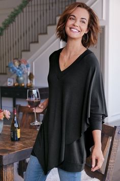 An easy-elegant tunic with cape-like overlay on one side, V-neck and raglan sleeves. Tunic Tops With Jeans, Tops With Jeans, Poncho Wrap, Embroidered Tunic Top, Zippered Sweater, Caftan Dress, Embroidered Tunic, Purple Sweater, Knitted Poncho