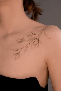 a woman with a tattoo on her chest