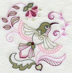 a white towel with pink and green designs on it's side, in the shape of a bird