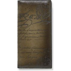 a brown leather wallet with writing on it