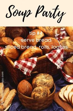 a basket full of bread sitting on top of a table next to other breads