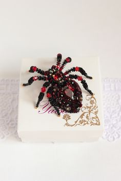 "Ruby Red Spider brooch it is embroidered brooch by gemstone and crystal. This insect jewelry is the best Halloween gift. Spider jewelry has a size 2.4*2.8 inches (6*7 cm). Video of this item you can see here https://youtu.be/4aDNPdXYIjU Beaded spider brooch, designer's jewelry inspired by Nature - insect brooch Spider with Czech crystal beads. It will perfectly complement your unique jewelry collection or will be a wonderful gift as a Halloween brooch. Looks very elegant! A Spider jewelry brooc Gothic Brooch Jewelry Gift, Gothic Halloween Brooches For Gift, Handmade Brooches For Halloween Gift, Halloween Brooch Jewelry Gift, Halloween Gift Jewelry Brooch, Halloween Brooch, Spider Brooch, Insect Brooch, Spider Jewelry