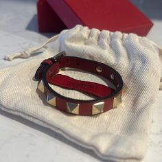 Valentino Red Rock Stud Bracelet. Comes With Packaging, Extra Studs, And Authentication Pamphlet. One Stud Has Scuffing But Can Be Replaced With The Extra Studs At The Store. Red Rock, Red Valentino, Womens Jewelry Bracelets, Women Jewelry, Red, Women Shopping, Color