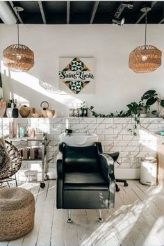 a living room filled with lots of furniture and plants on top of the walls in front of them