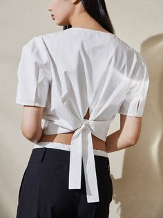 Elegant Cotton Top With Tie Back, Elegant Cotton Tops With Tie Back, Elegant Cotton Tie Back Tops, Cotton Tie-back Tops For Daywear, Cotton Tops With Tie Back For Daywear, Cotton Tie Back Tops For Daywear, Chic Cotton Blouse With Tie Back, Elegant Tops With Tie Straps For Day Out, Elegant Cotton Tops With Tie Straps