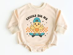 Chicks Dig Me Easter Bubble Romper Sweatshirt, Easter Baby Outfit, Baby Boy Easter Outfit, Baby Bodysuit, Baby Easter Outfit, Easter Shirt 💗  Welcome to The WildflowerbyMiley Etsy Shop!  This listing is for the bodysuit, sweatshirt or t-shirt only. All other items that are shown in our photos such as shoes, hats, beanies, blankets etc. are for photo staging purposes and are NOT INCLUDED in the sale. DESCRIPTION:  This baby and children's unisex essential fits like a well-loved favorite. Super s Casual Long Sleeve Onesie With Graphic Print, Casual Long Sleeve Graphic Print Onesie, Cute Onesie With Letter Print For Playwear, Cute Long Sleeve Onesie With Graphic Print, Cute Graphic Print Onesie For First Birthday, Unisex Cute Onesie With Graphic Print, Cute Graphic Print Onesie For Playwear, Easter Baby Outfit, Boy Easter Outfit