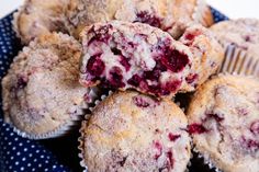 muffins piled on top of each other with cranberry filling in them