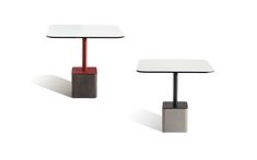 two tables with different shapes and sizes, one is white and the other is red