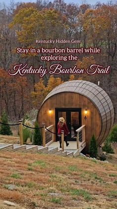 a woman walking up the steps to a barrel house with text that reads stay in a bourbon barrel while exploring the kentucky bourbon trail