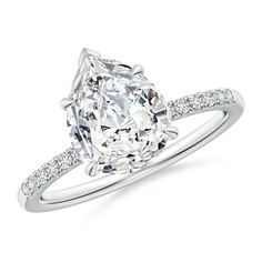 an oval cut diamond ring with pave set diamonds on the shoulders and sidestones