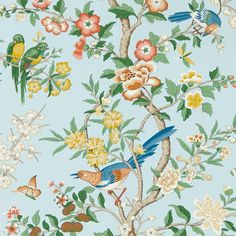 a blue wallpaper with birds and flowers on it