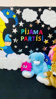 there are many stuffed animals in front of a sign that says puama partisi