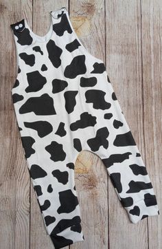 Cow print, cow print romper, knit cow print romper, baby romper, toddler knit romper, organic knit romper, cow organic knit romper costume by ExclusiveTB on Etsy Cow Onesie, Cow Print Overalls, Cow Print Onesie, Cow Onesie Pajamas, Cow Halloween Costume, Cow Print Dress Toddler, Cow Print Fabric, Cow Ears, Cow Costume