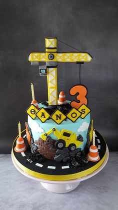 there is a cake that has construction on it