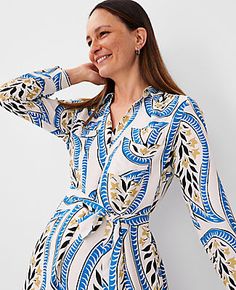 Elevate your wardrobe with the Ann Taylor Paisley Midi Pocket Shirtdress, a blend of classic charm and modern sophistication. This piece features a vibrant paisley print that adds a touch of elegance to any occasion.

- **Size**: XS
- **Color**: White
- **Material**: 100% Polyester
- **Gender**: Female
- **Sleeve Length**: Long sleeves with button cuffs
- **Features**: Point collar, button front placket, self-tie belt, chest flap patch pockets, shirred forward shoulder seams and back yoke, side Spring Workwear Dresses With Paisley Print, Getaway Dress, Work Sweaters, Female Sleeve, Tall Dresses, Work Skirts, Long Sleeve Dresses, Sleeve Dresses, Midi Maxi Dress