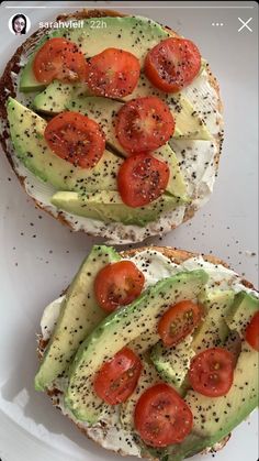 two slices of bread topped with avocado and tomatoes