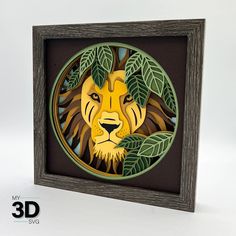 a 3d cut out of a lion with leaves on it's head in a wooden frame