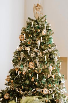 a decorated christmas tree in a living room