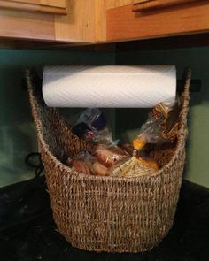 a wicker basket filled with food sitting on top of a stove