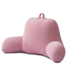 the pink pillow is shaped like an elephant