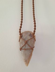 Arrowhead wrapped in brown waxed cord ~ Cord is very durable ~ Necklace is adjustable in length Adjustable Earthy Necklaces With Waxed Cord, Adjustable Rustic Necklace With Waxed Cord, Rustic Adjustable Necklace With Waxed Cord, Rustic Brown Waxed Cord Necklace, Adjustable Brown Necklace With Waxed Cord, Adjustable Brown Waxed Cord Necklace, Hand Wrapped Adjustable Necklace With Waxed Cord, Hand Wrapped Waxed Cord Necklace Adjustable, Earthy Brown Waxed Cord Necklaces