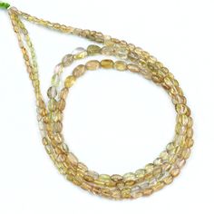 three strands of yellow and brown glass beads